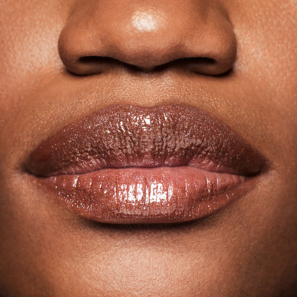 GLOSS BOMB STIX SHIMMER (LABIAL CON ACABADO BRILLOSO)